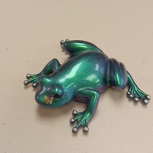 Handcrafted resin frog with butterfly